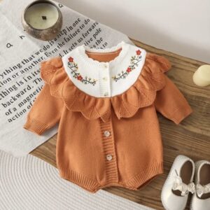 Enterizo punto naranja 6/9m